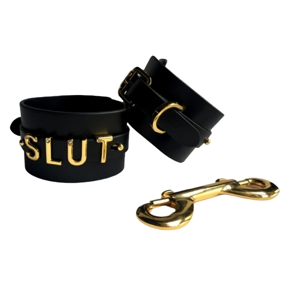 Наручники с надписью Slut от UPKO, из натуральной кожи, черные с золотой фурнитурой (332017), zoom