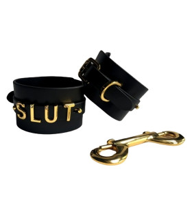 Наручники с надписью Slut от UPKO, из натуральной кожи, черные с золотой фурнитурой - No Taboo